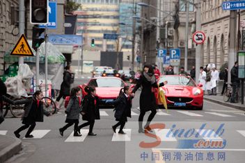 Girl and children crossing the street